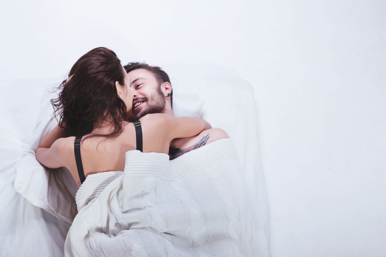 beautiful-loving-couple-is-posing-in-a-bed-pv3cw24-1-1586096225.jpg