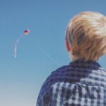 boy-flying-kite-pfv3fmq-1590753727.jpg