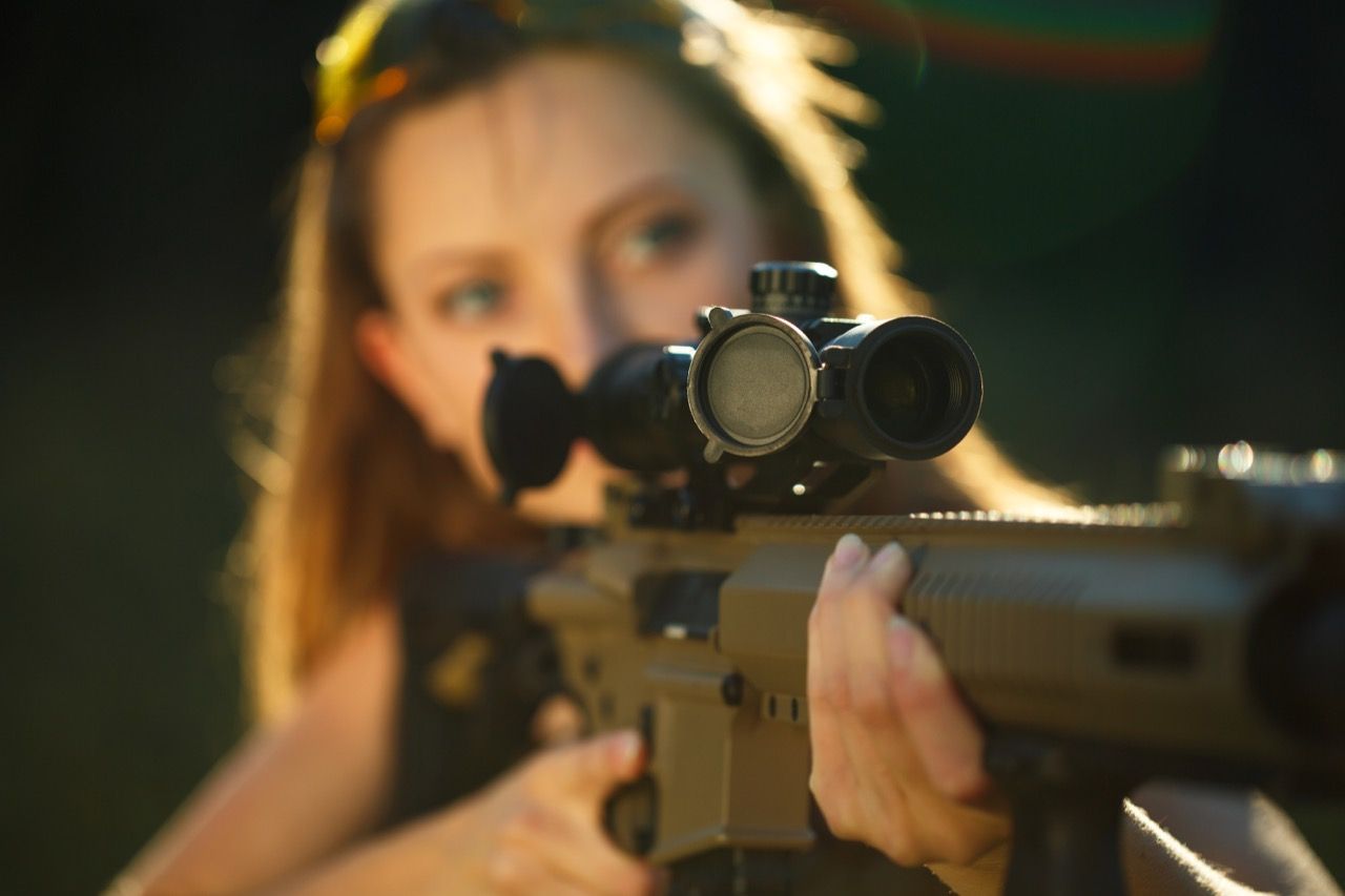 girl-with-a-gun-for-trap-shooting-aiming-at-a-targ-pjv97sl-1586007948.jpg