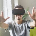 young-handsome-man-playing-video-games-in-smart-3d-tech-at-home.jpg
